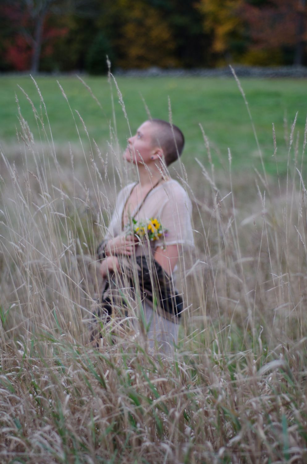 Vanessa Hale standing in a field of tall grass